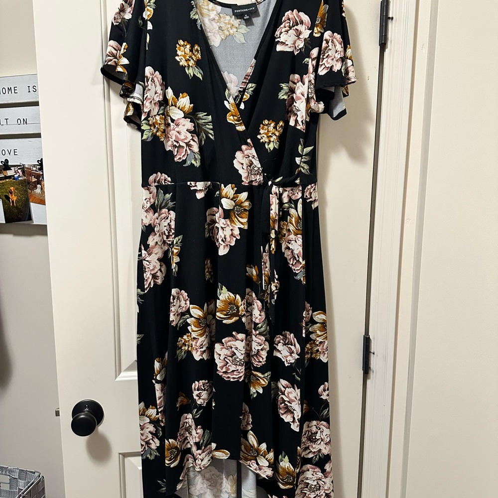 High low dress worn twice. Ties on side. Looks great on!